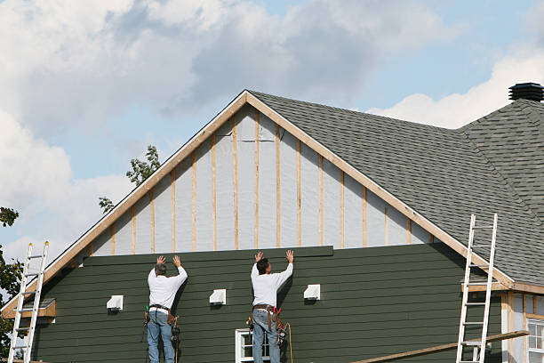Professional Siding Installation technician working in Midland, PA